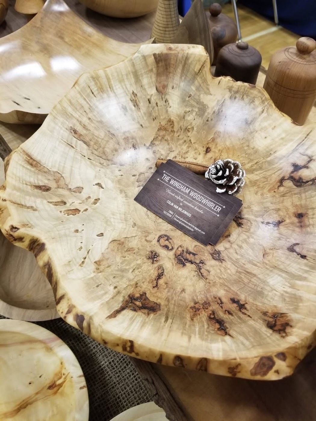 A wide burl bowl with dark figure through the grain